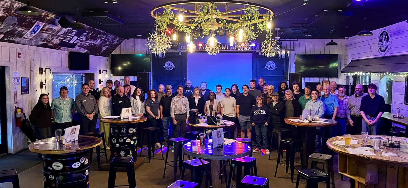 The Wolf Family Hardware team celebrating the acquisition with the Aubuchon team!