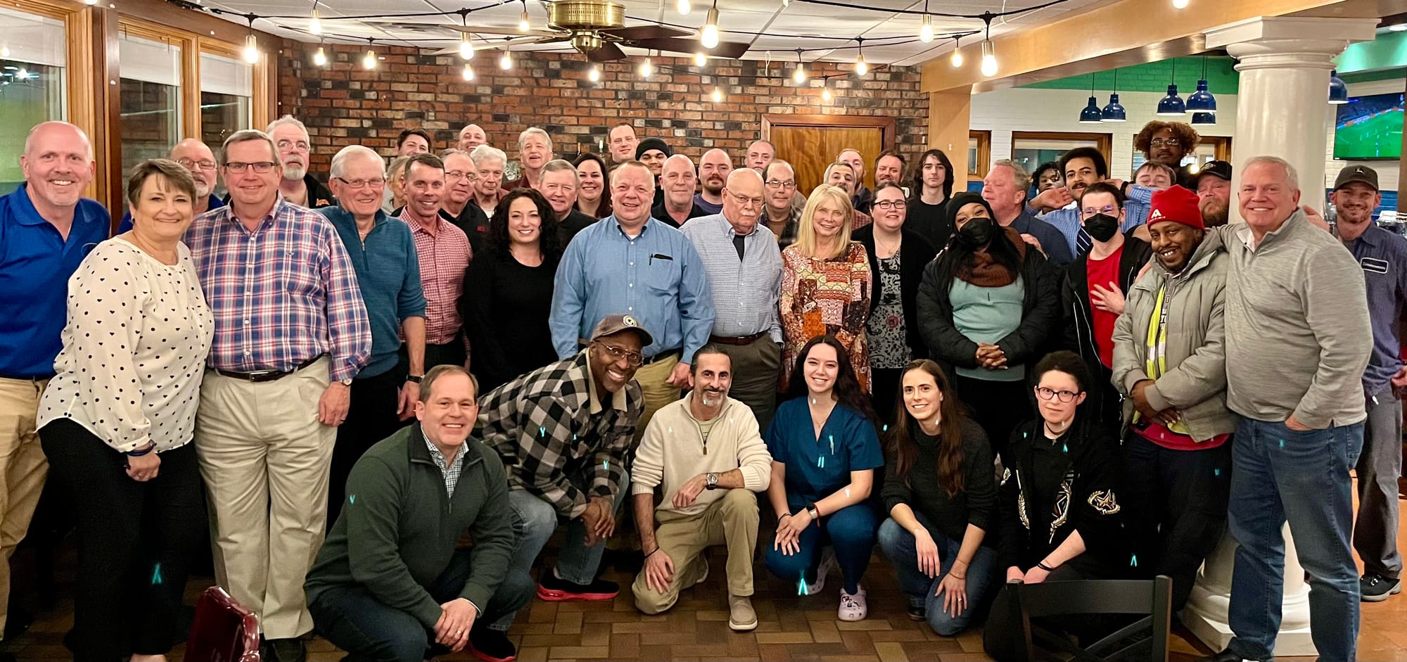 The Zimmerman's team and Aubuchon team celebrating the acquisition!