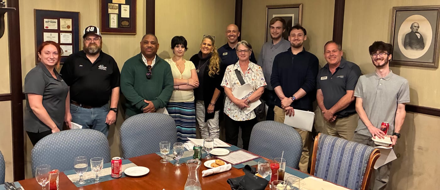 The Anchor Ace Hardware team and the Aubuchon team celebrating the acquisition