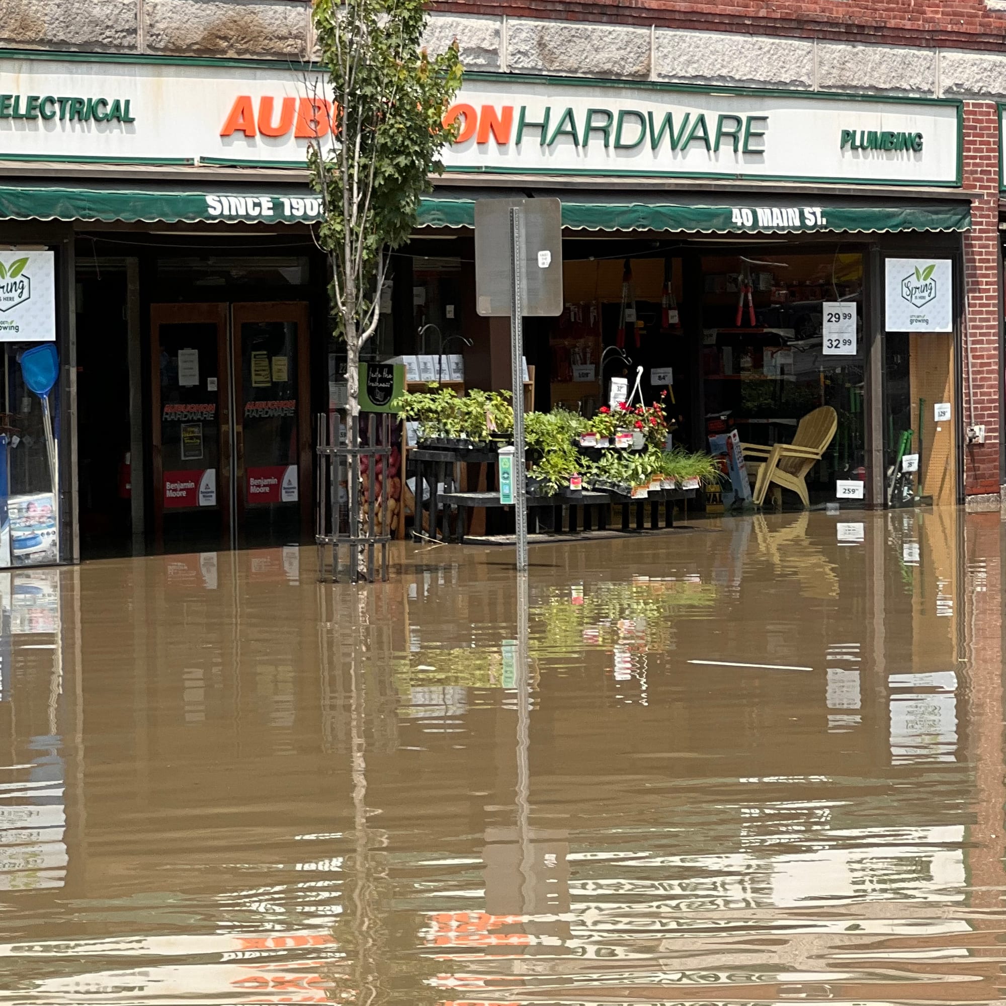 Aubuchon Hardware storefront during the flood on Main St, Montpelier, VT