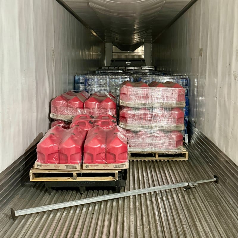 The tractor trailer truckload containing 96 gas cans & 588 cases of water!