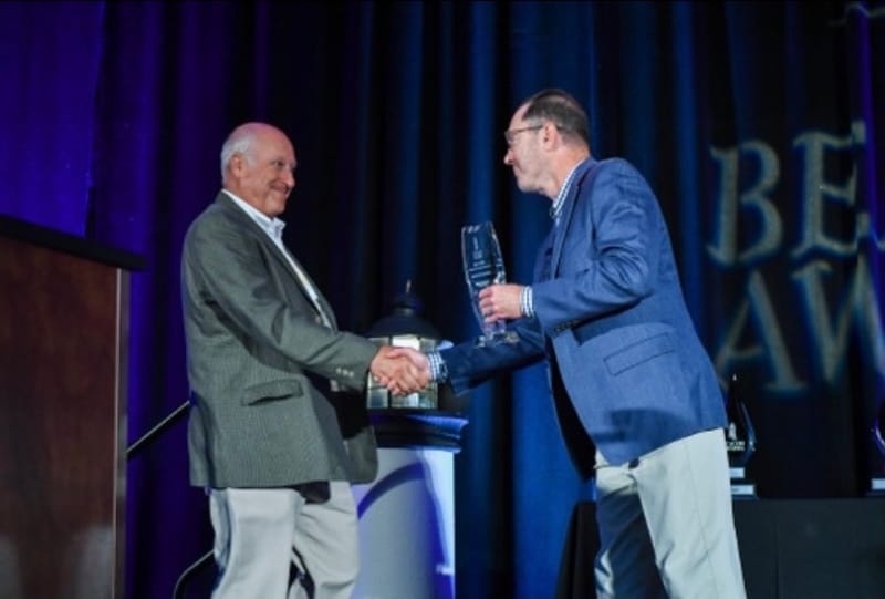 Bernard W. Aubuchon Jr. receives the Beacon Award for Community Service at the 2020/2021 Hardware Connection Conference.