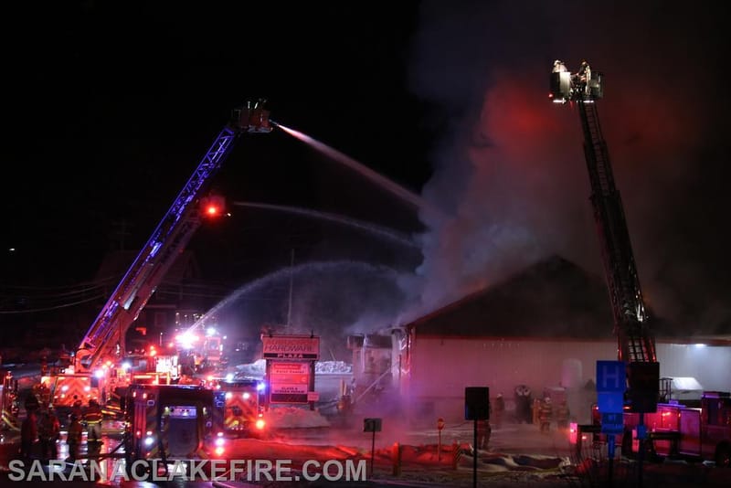 Firefighters from around the region battling the blaze on upper Broadway, Saranac Lake.