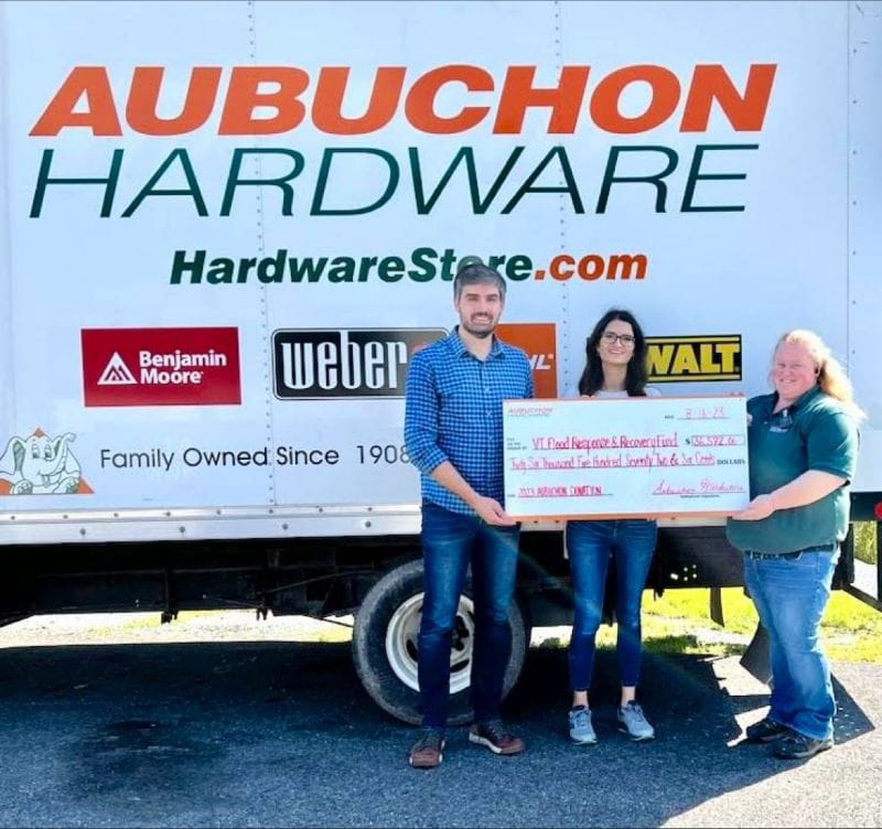 Middlebury, VT store manager, Renee Carpenter, presenting the $36,572 check to The Vermont Community Foundation.